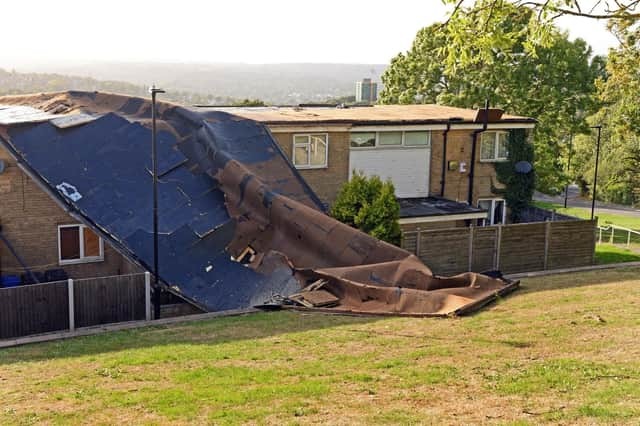 The roof coming off the home.