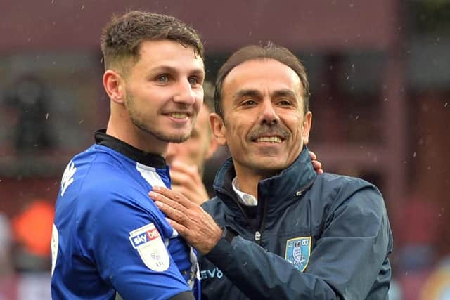 Celebrating victory at Aston Villa with Jos Luhukay