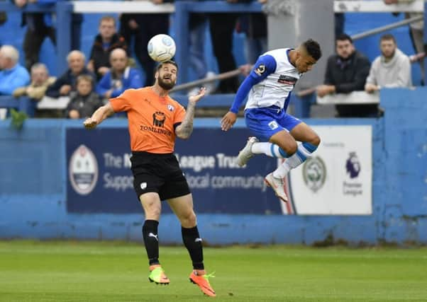 ChesterfieldÃ¢Â¬"s Michael Nelson beats Barrow's Tyler Smith to a header: Picture by Steve Flynn/AHPIX.com, Football: Vanarama National League match Barrow -V- Chesterfield at Holker Street, Barrow, Cumbria, England copyright picture Howard Roe 07973 739229