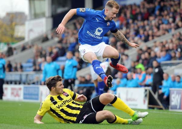 Chesterfield v AFC Fylde.
Lee Shaw takes some evasive action early in the second half.