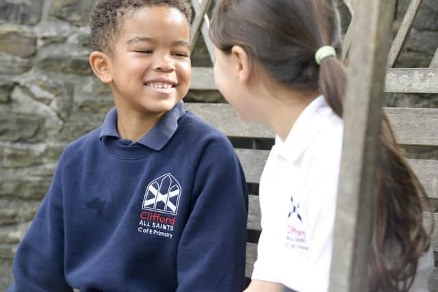 Year two pupils at Clifford All Saints C of E Primary School wearing the new school uniform