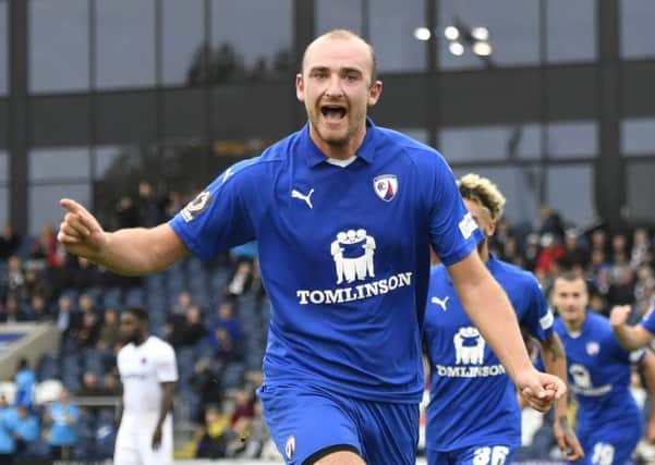 Chesterfield's Tom Denton celebrates after scoring his second goal: Picture by Steve Flynn/AHPIX.com, Football: The Emirates FA Cup - Qualifing Fourth Round match AFC Fylde -V- Chesterfield at Mill Farm, Wesham, Lancashire, England on copyright picture Howard Roe 07973 739229