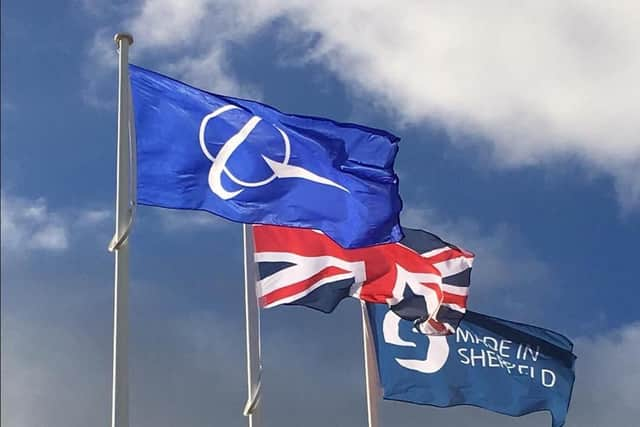 Boeing, Union Jack and Made in Sheffield flags flying outside Boeing Sheffield which was being opened today.