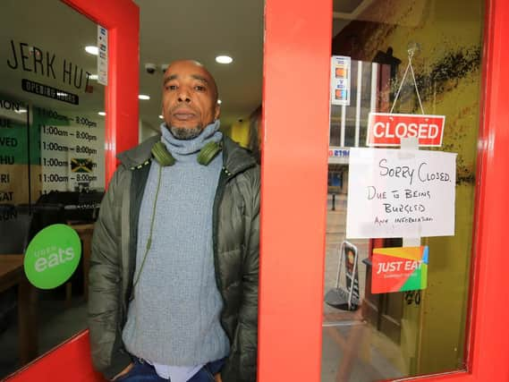 Paul Simmonds from the Jerk Hut on High Street in Sheffield after it was broken into on Monday. Picture: Chris Etchells.