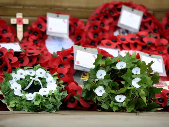 Wreaths of white poppies