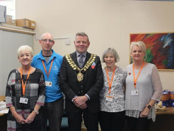 Barnsley Mayor, Coun Steve Green with the Barnsley Hospice blue box team