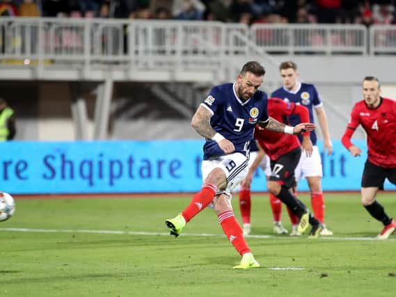 Steven Fletcher nets for Scotland.