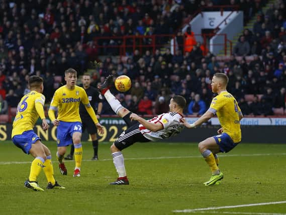 Conor Washington of Sheffield Utd attempts an over head kick which hits the cross bar during the Sky Bet Championship match at Bramall Lane Stadium, Sheffield.  Simon Bellis/Sportimage