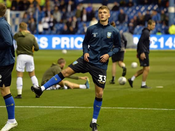 Unkown Owls youngster Isaac Rice on the subs bench takes part in the pre match warm up.........Pic Steve Ellis