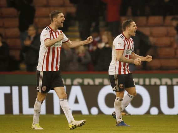 Chris Basham and Billy Sharp celebrates victory