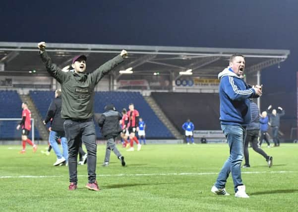 Chesterfield fans invade the pitch during their sides drubbing from Solihull Moors: Picture by Steve Flynn/AHPIX.com, Football: The Vanarama National League match Chesterfield -V- Solihull Moors at Proact Stadium, Chesterfield, Derbyshire, England copyright picture Howard Roe 07973 739229