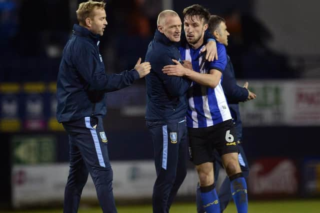 Nicky Weaver and Lee Bullen with Morgan Fox at the final whistle. Pic Steve Ellis.