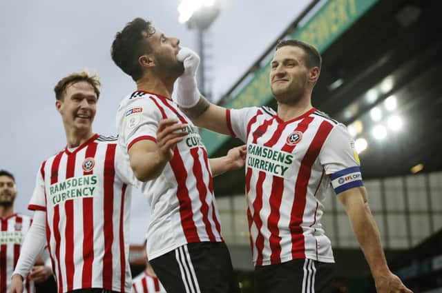 Billy Sharp celebrates scoring with George Baldock. Photo: Simon Bellis/Sportimage