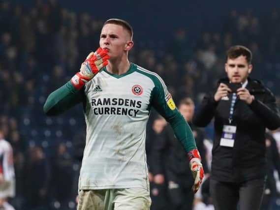 Dean Henderson celebrates victory