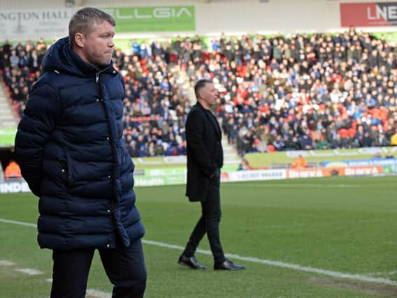 Rovers boss Grant McCann with ex-manager Darren Ferguson