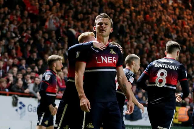 Andy Butler celebrates his goal against Charlton Athletic in the play-offs