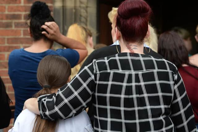 Mourners at the candlelight vigil for teenagers Blake and Tristan Barrass, held at St James' & St Christopher's Church in Shiregreen (pic: Steve Ellis)