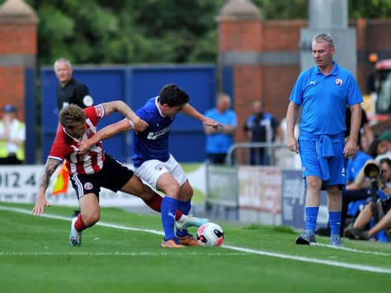 John Sheridan watched his side take on a Premier League outfit last night