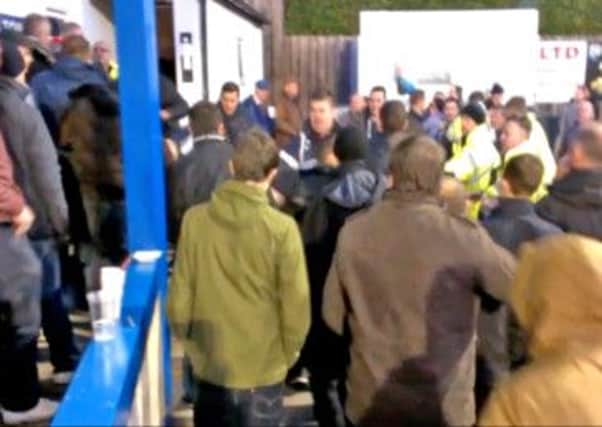 Football fans clash at a non league game