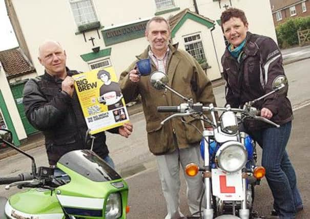 Outside the River Don in Eastoft are Big Brew participants Gavin and Helen Thompson and Peter Walker. (Buy this photo E2256TS) Picture: Tony Saxton