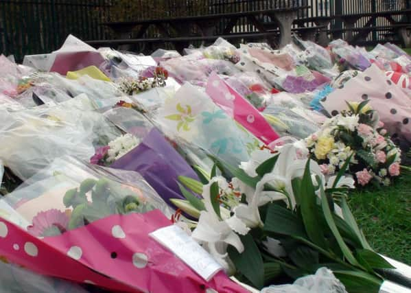 Floral tributes outside Danum Academy in Doncaster for the five teenagers who died in a two-car collision on Saturday.