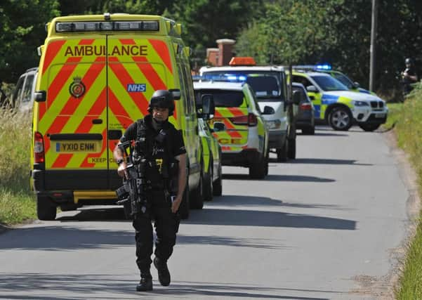 Armed police on The Cove, Westwoodside were there are reports of an armed person on the loose. Picture: Andrew Roe