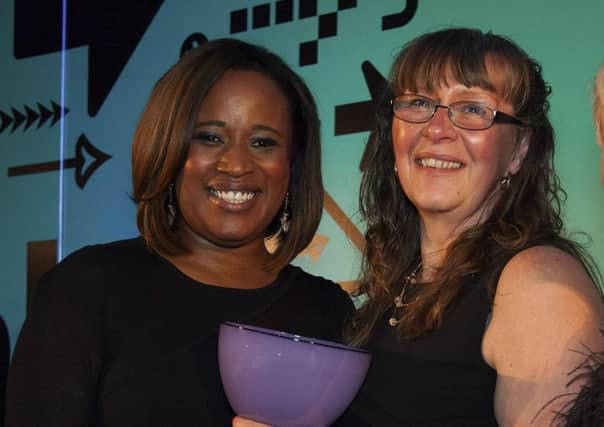 L-R Charlene White (Awards host), Anne Wilson of Numill (winner business woman of the year) and