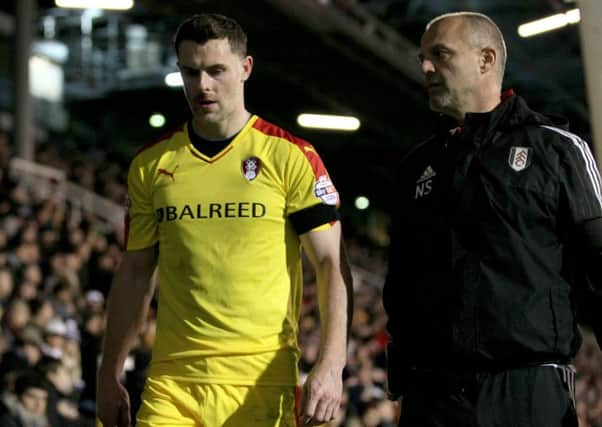 Frazer Richardson leaves the field at Fulham