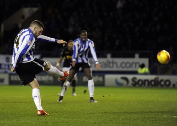 Gary Hooper lashes home the winner for Sheffield Wednesday