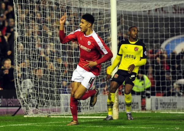 On loan Ashley Fletcher celebrates his debut goal for Barnsley