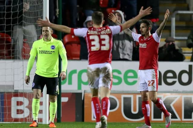 The Millers celebrate their second goal against Brighton