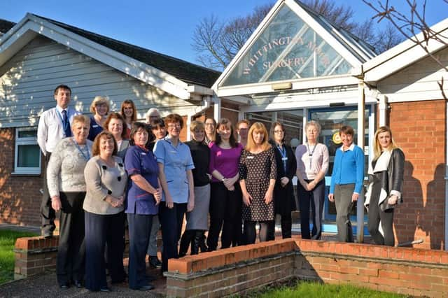 Staff at Whittington Moor Surgery celebrate their outstanding rating in a Care Quality Commission report. Picture by Jason Chadwick.