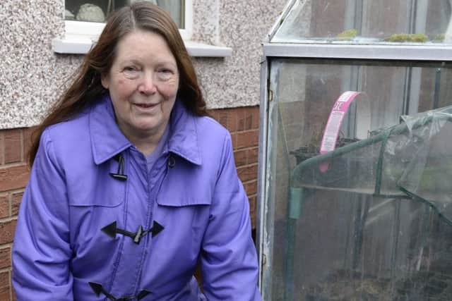 Anne Parrot has Rhododendron flowering six months early in her garden in Carcroft, Doncaster