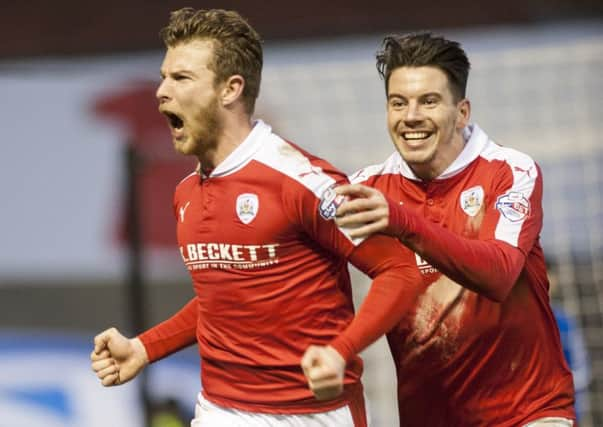 Hat-trick hero   Sam Winnall celebrates with Adam Hammill. 
Picture Dean Atkins