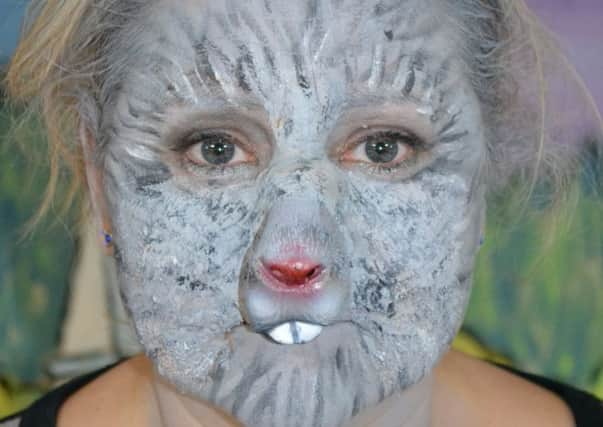 Tara Parkes tries out make-up for her role as Queen Rat in Thurgoland Thespians' panto The Pied Piper of Hamelin