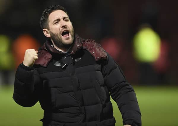 Barnsley's Lee Johnson celebrates at full time.