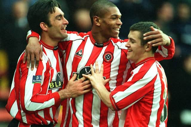 Utd hat-trick man Marcus Bent celebrates his last goal with team-mate Shaun Murphy and Alex Noteman