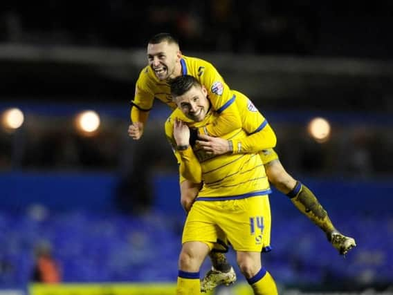 Two-goal hero Gary Hooper with Jack Hunt