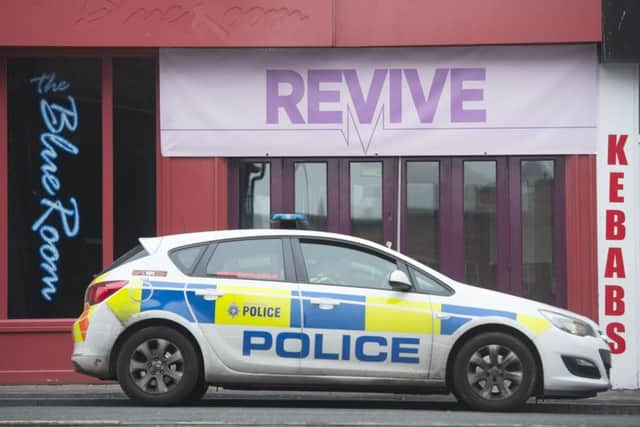 Police outside The Blue Room Bar on Wellington Street in Barnsley