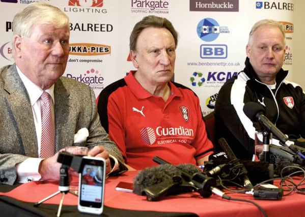 New boss Neil Warnock, flanked by chairman Tony Stewart and No 2 Kevin Blackwell