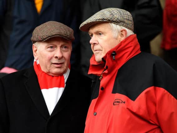 A couple of fans chat before Doncaster Rovers v Sheffield United at the Keepmoat