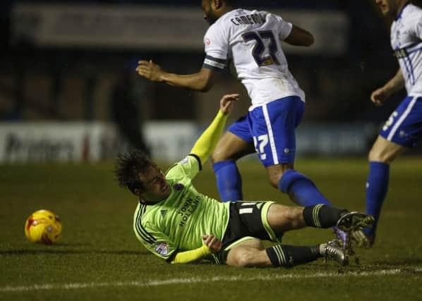 Jose Baxter takes a tumble at Bury