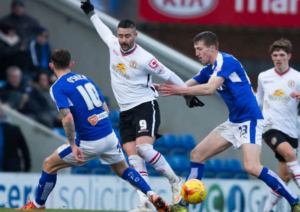 Chesterfield vs Crewe Alexandra - Jay O'Shea and Tom Anderson battle for the ball - Pic By James Williamson