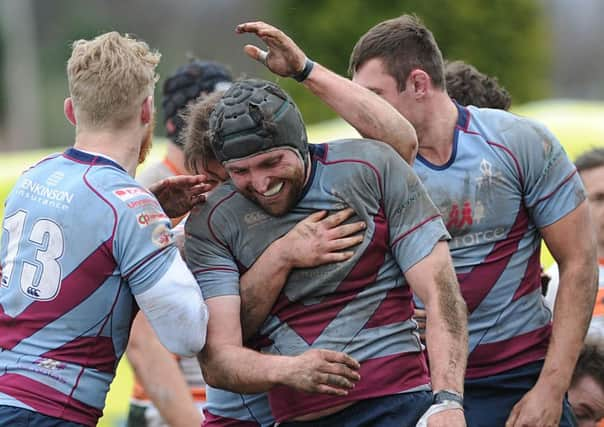 Rotherham Titan' Tom Calladine is congratulated on his second try. Picture Scott Merrylees