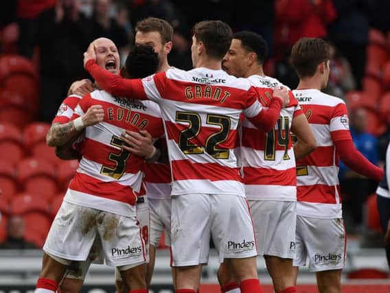 Rovers players congratulate Richard Chaplow on his equaliser