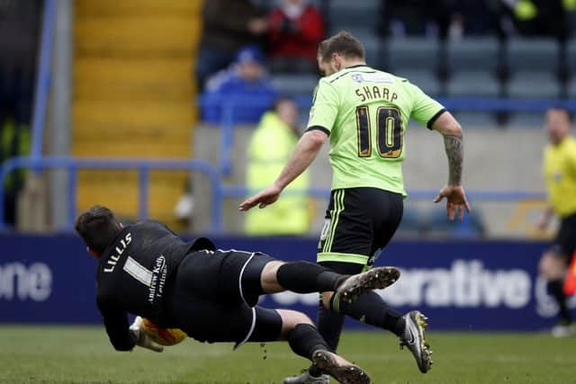 Billy Sharp is denied by Josh Lillis