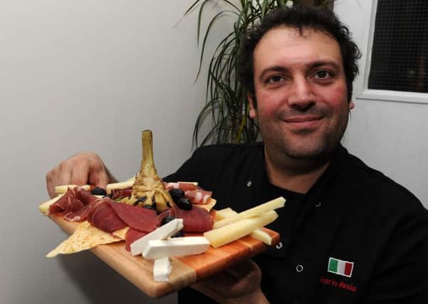 Marco Masia, of Akentannos holds a antipasto alla sarda. Picture: Andrew Roe