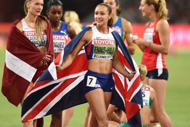 Jessica Ennis-Hill celebrates winning the gold medal in the Women's Heptathlon, during the IAAF 2015 World Championships.  Adam Davy/PA Wire.