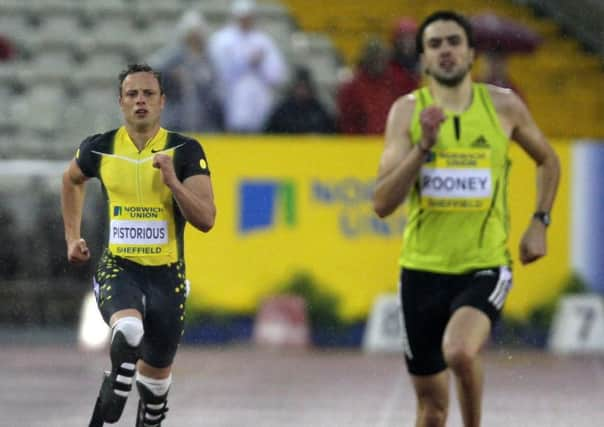 File photo dated 15/07/07 of South Africa's Oscar Pistorius (left) in the Men's 400m Race during the Norwich Union British Grand Prix at the Don Valley Stadium, Sheffield. PRESS ASSOCIATION photo. Issue date: Monday January 14, 2008. The IAAF have ruled that double-amputee Oscar Pistorious' prosthetic limbs give him an unfair advantage and he is therefore ineligible to compete at this summer's Olympic Games. See PA story ATHLETICS Pistorius. Photo Credit should read: John Giles/PA Wire.