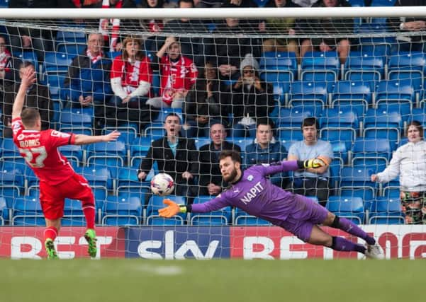 Chesterfield vs Walsall - Tommy Lee palms the ball away from the path of Walsall's Bryn Morris - Pic By James Williamson